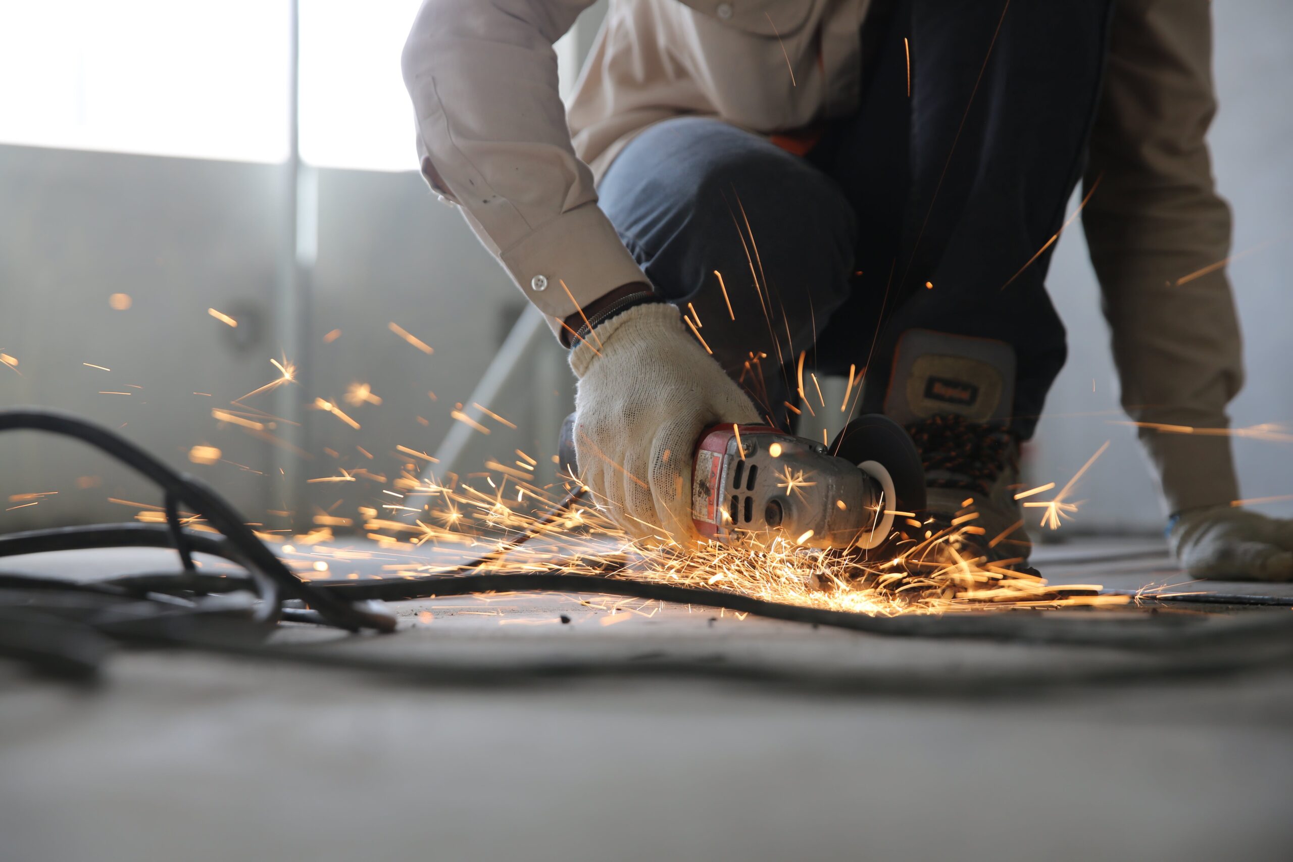 man with angle grinder